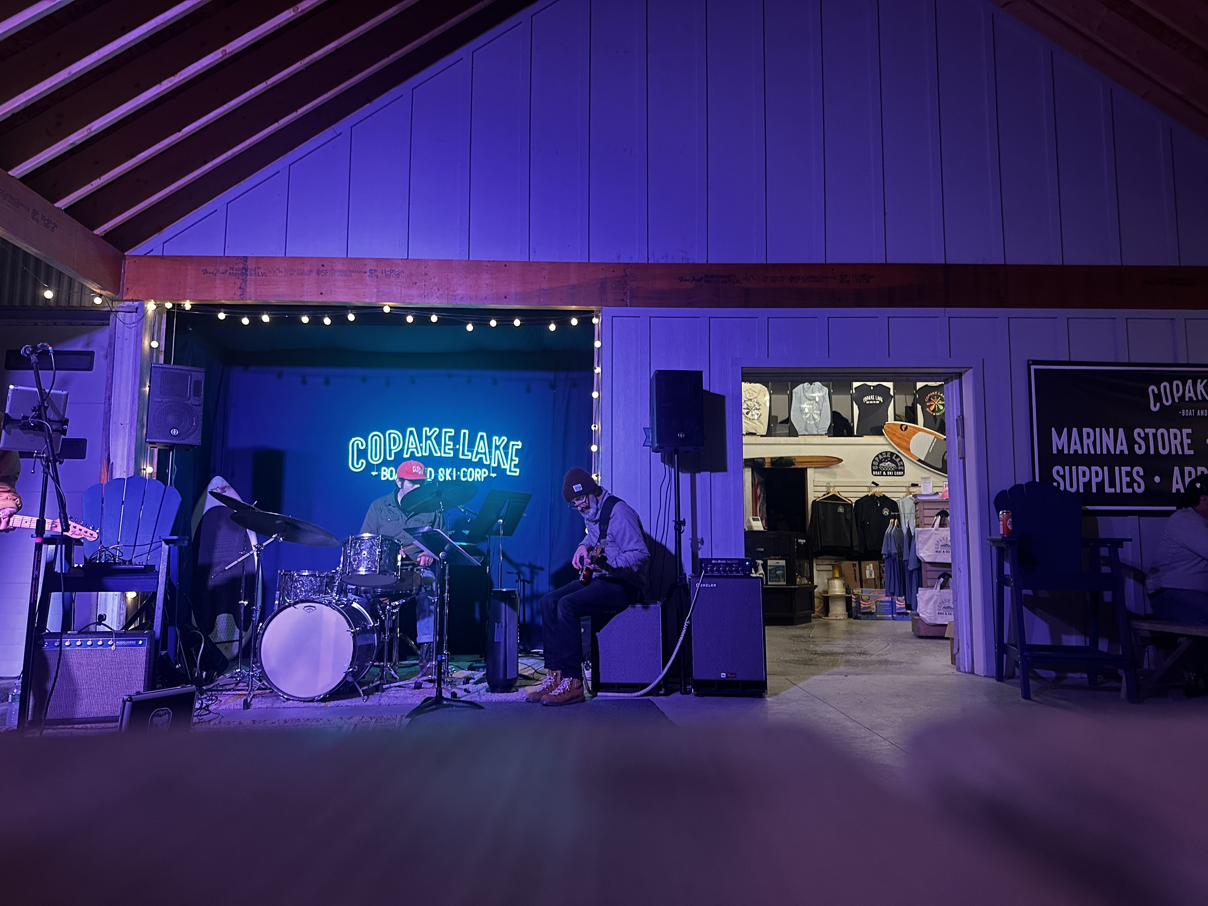 A band performing beside the marina shop at Copake Lake Boat and Ski